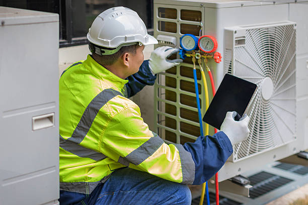 Professional Hvac technician working in West Medford, MA